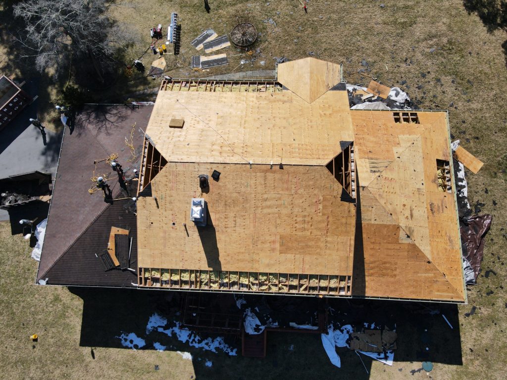 Overhead view of a home getting it's roof replaced